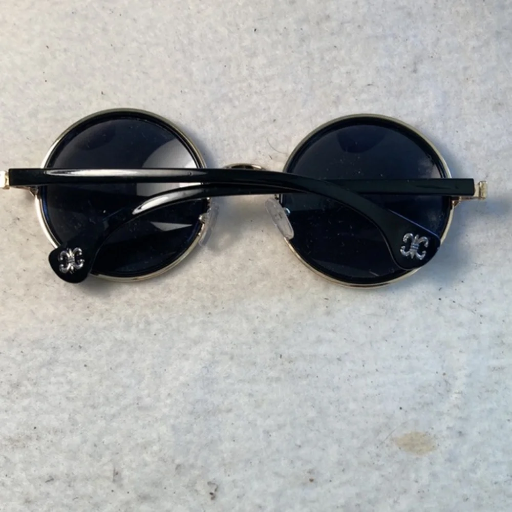 Woman’s Hippie Style Round Gold Toned and Black Frame and Black Lens